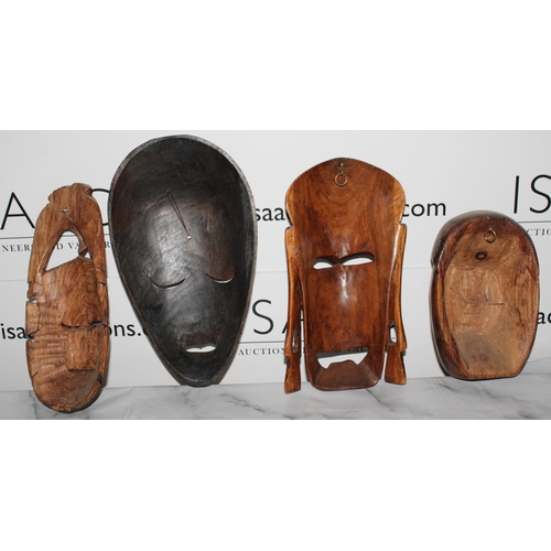 119 - Four Wooden Masks
Tallest-33.5cm