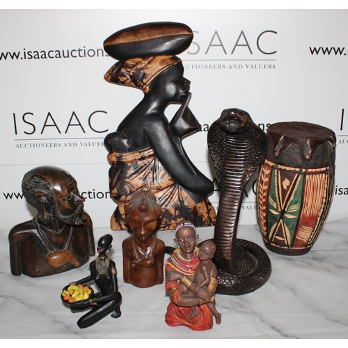 56 - Collection Of Wooden African Themed Items
Tallest-46cm