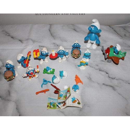 70 - Collection Of Collectable Smurfs
In Pouch