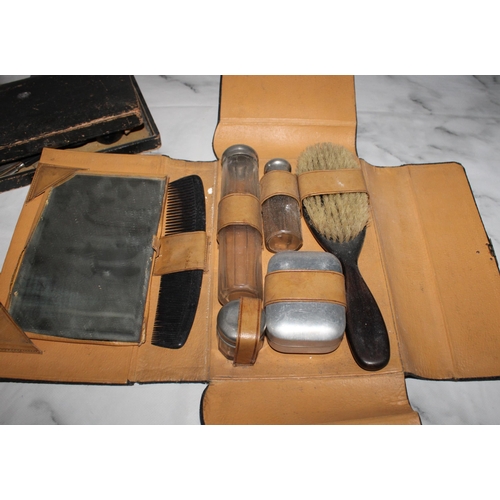 32 - Two Men's Vanity Sets