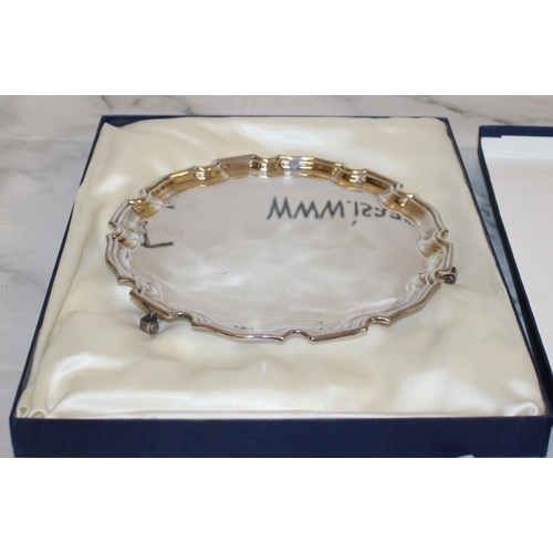 477 - Silver Hallmarked Plate on Feet in Box

20.5cm Diameter

Weighs 290 gms