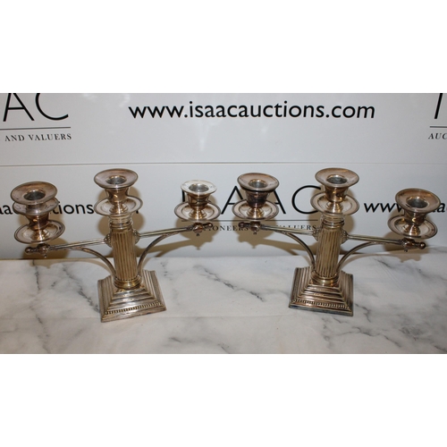 482 - Pair of Silver Plated Candleabra

Measures 27cm x 17cm Tall