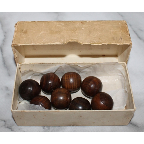 868 - Complete Set of Vintage Wooden Miniature Bowls with Jack.
Two sets of Bowls numbered 1 to 4.