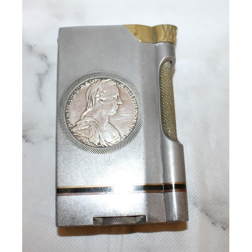 118 - Two Collectable Lighters (Untested)
Largest-11cm Length
6.5cm Wide