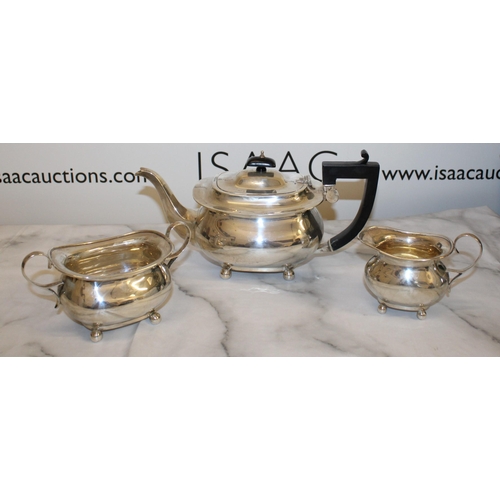 869 - Silver Hallmarked Tea Set Inc
Tea Pot
Sugar Bowl
Milk Jug
Total Weight-1050g
Good Condition