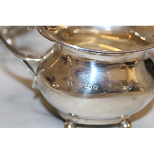 869 - Silver Hallmarked Tea Set Inc
Tea Pot
Sugar Bowl
Milk Jug
Total Weight-1050g
Good Condition