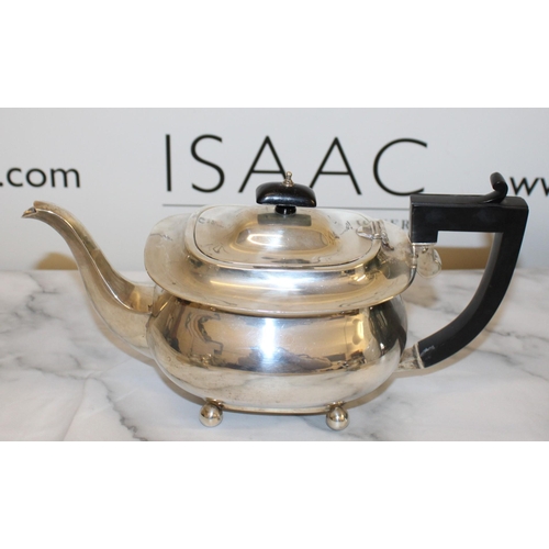 869 - Silver Hallmarked Tea Set Inc
Tea Pot
Sugar Bowl
Milk Jug
Total Weight-1050g
Good Condition