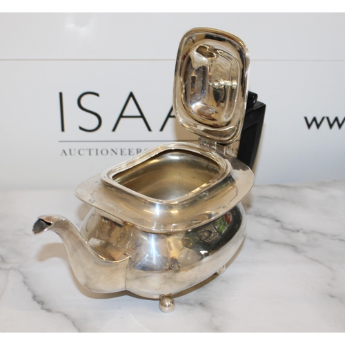 869 - Silver Hallmarked Tea Set Inc
Tea Pot
Sugar Bowl
Milk Jug
Total Weight-1050g
Good Condition