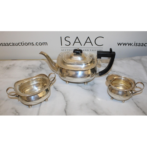 869 - Silver Hallmarked Tea Set Inc
Tea Pot
Sugar Bowl
Milk Jug
Total Weight-1050g
Good Condition