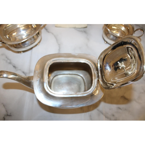 869 - Silver Hallmarked Tea Set Inc
Tea Pot
Sugar Bowl
Milk Jug
Total Weight-1050g
Good Condition