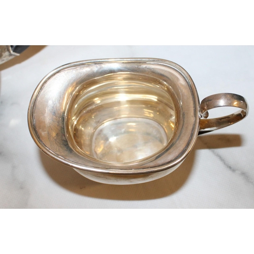 869 - Silver Hallmarked Tea Set Inc
Tea Pot
Sugar Bowl
Milk Jug
Total Weight-1050g
Good Condition