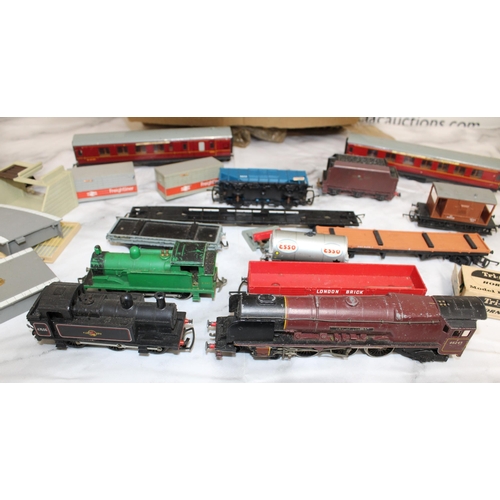 218 - OO Guage Train Track, Engines & Accessories
Three Engines included. one being 