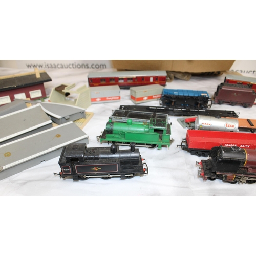 218 - OO Guage Train Track, Engines & Accessories
Three Engines included. one being 