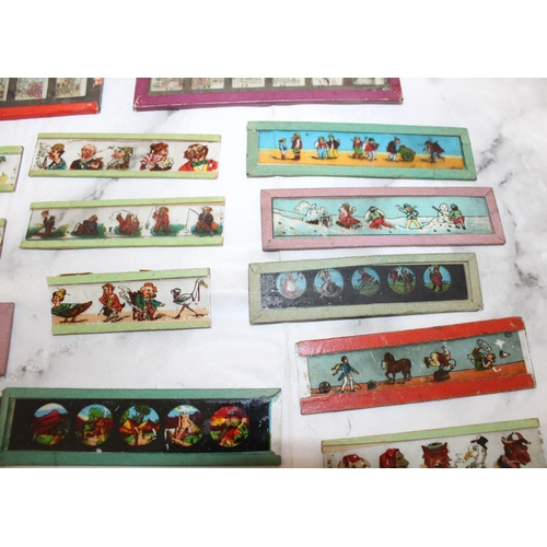 10 - Miniature Glass Lantern Slides featuring Snow White and Micky Mouse plus others