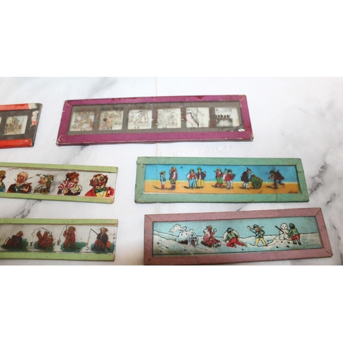 10 - Miniature Glass Lantern Slides featuring Snow White and Micky Mouse plus others