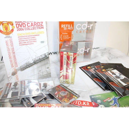 198 - Quantity Of Collectable Manchester United Items Inc-
Refill 5 x 10 Pack Cd-r Cards z