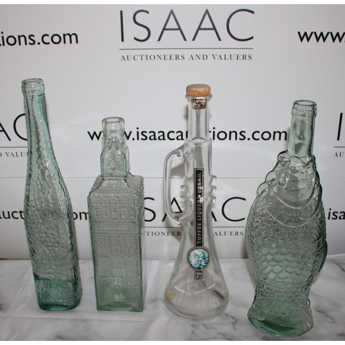 141 - Collection Of Glass Bottles
Tallest-35.5cm
Collection Only