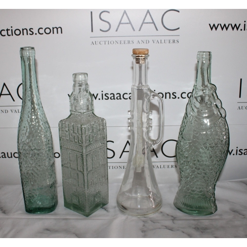 141 - Collection Of Glass Bottles
Tallest-35.5cm
Collection Only