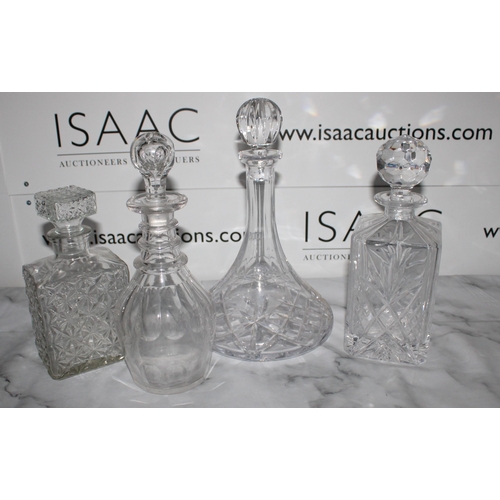 142 - Four Glass Decanters 

Collection Only