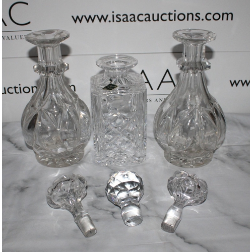 143 - Three Glass Decanters including a Pair

Collection Only