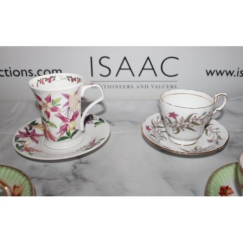 158 - Collection Of Collectable Cups & Saucers Inc-
Paragon Fine Bone China
Dunoon Flower Of The Month Aqu... 