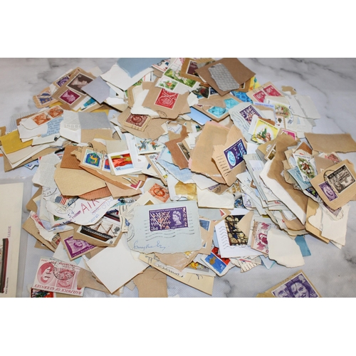 22 - Quantity Of Worldwide Loose Stamps...