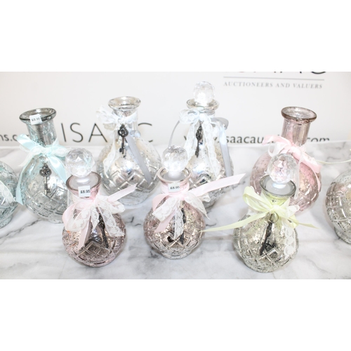 147 - Quantity of Glass Decorative Vases - Some Stoppers  - ( Stock From Jewellery Shop Clearance)

Larges... 