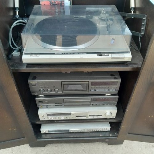 197 - Technics 5 Piece Stacking System in Cabinet with Speakers on Adjustable Stands. Untested

Collection... 