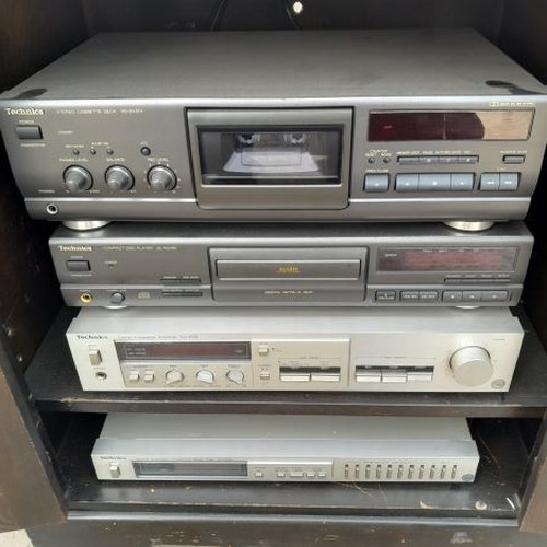 197 - Technics 5 Piece Stacking System in Cabinet with Speakers on Adjustable Stands. Untested

Collection... 