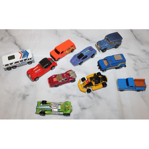 319 - Ten Hotwheels / Majorette Dinky Vehicles