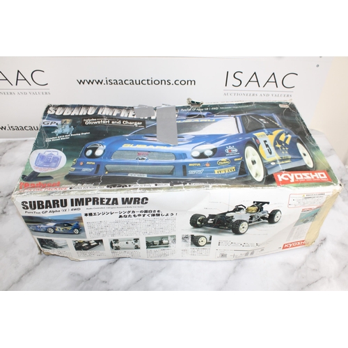 371 - Boxed KYOSHO Subaru Impreza WRG RC .12Engine Powered Rally Car Series With Accessories