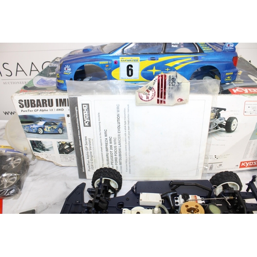 371 - Boxed KYOSHO Subaru Impreza WRG RC .12Engine Powered Rally Car Series With Accessories