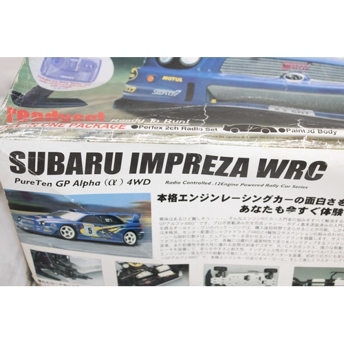 371 - Boxed KYOSHO Subaru Impreza WRG RC .12Engine Powered Rally Car Series With Accessories