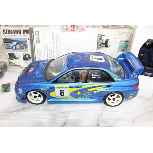 371 - Boxed KYOSHO Subaru Impreza WRG RC .12Engine Powered Rally Car Series With Accessories