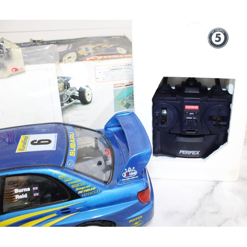 371 - Boxed KYOSHO Subaru Impreza WRG RC .12Engine Powered Rally Car Series With Accessories