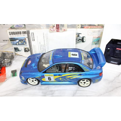 371 - Boxed KYOSHO Subaru Impreza WRG RC .12Engine Powered Rally Car Series With Accessories