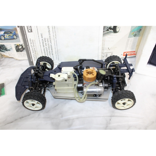 371 - Boxed KYOSHO Subaru Impreza WRG RC .12Engine Powered Rally Car Series With Accessories