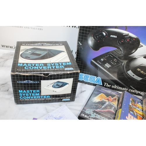 374 - Sega Mega Drive In Box With Games
9 x Games 
1 x Empty Game Box
2 x Controllers
Untested