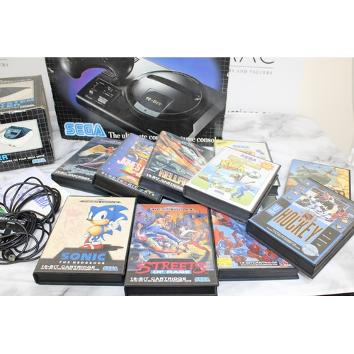 374 - Sega Mega Drive In Box With Games
9 x Games 
1 x Empty Game Box
2 x Controllers
Untested