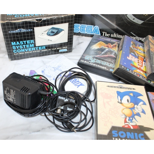 374 - Sega Mega Drive In Box With Games
9 x Games 
1 x Empty Game Box
2 x Controllers
Untested