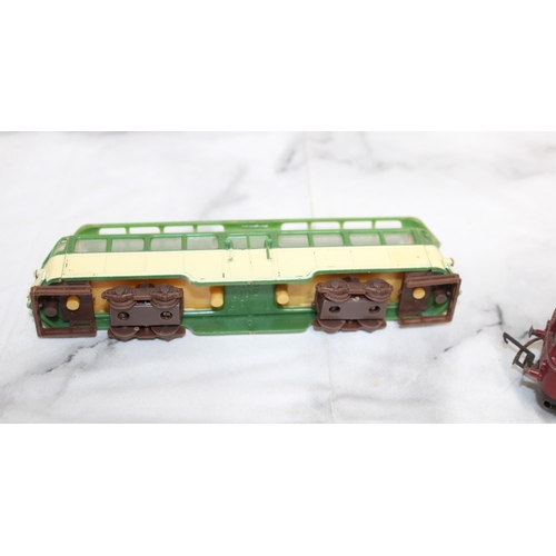 388 - Pair of Plastic Trams / Switches etc