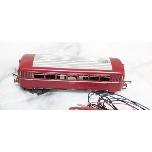 388 - Pair of Plastic Trams / Switches etc