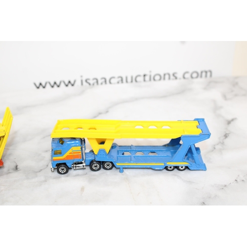 448 - Pair of Rarer Version Matchbox Transporters