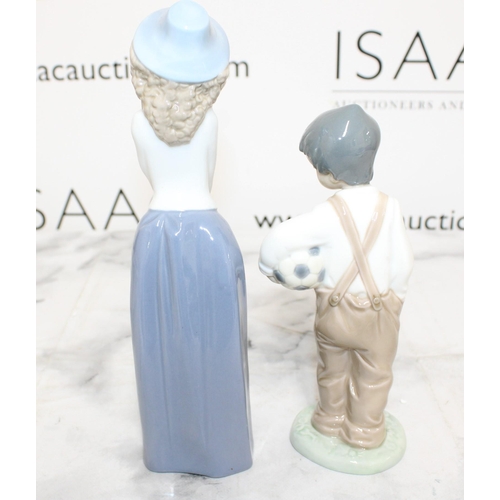 169 - Two NAO Figurines Tallest-24cm
Collection Only