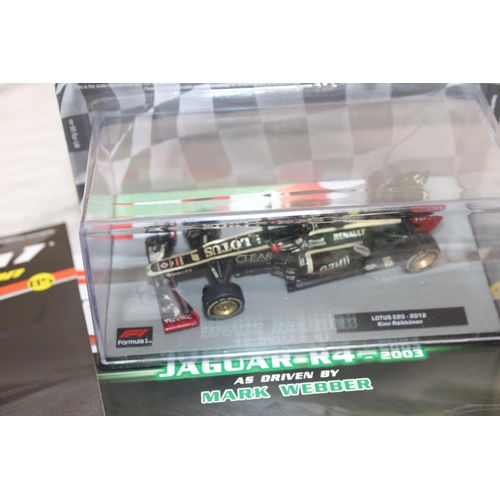 484 - Five Formula 1 Collectable Racing Cars With Five Magazines