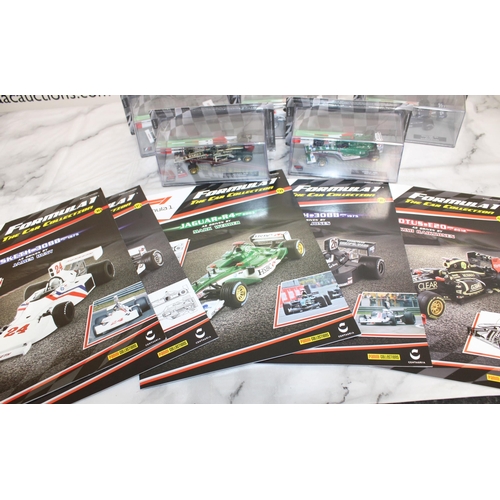 484 - Five Formula 1 Collectable Racing Cars With Five Magazines