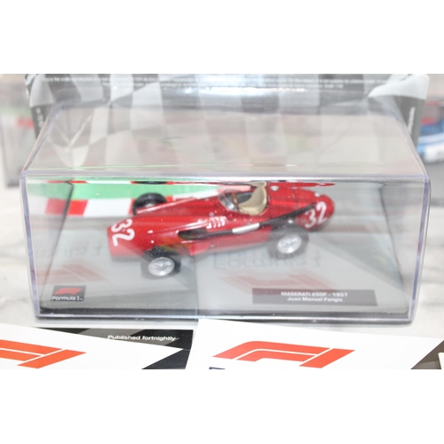 485 - Five Collectable Formula 1 Packed Racing Cars With Five Magazines