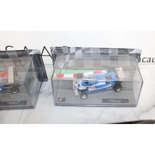 487 - Five Collectable Formula 1 Packed Racing Cars With Five Magazines