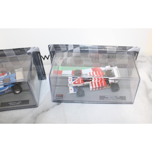 487 - Five Collectable Formula 1 Packed Racing Cars With Five Magazines