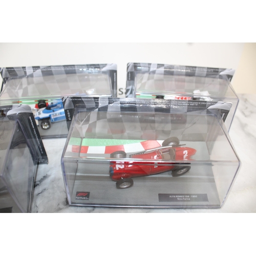 487 - Five Collectable Formula 1 Packed Racing Cars With Five Magazines